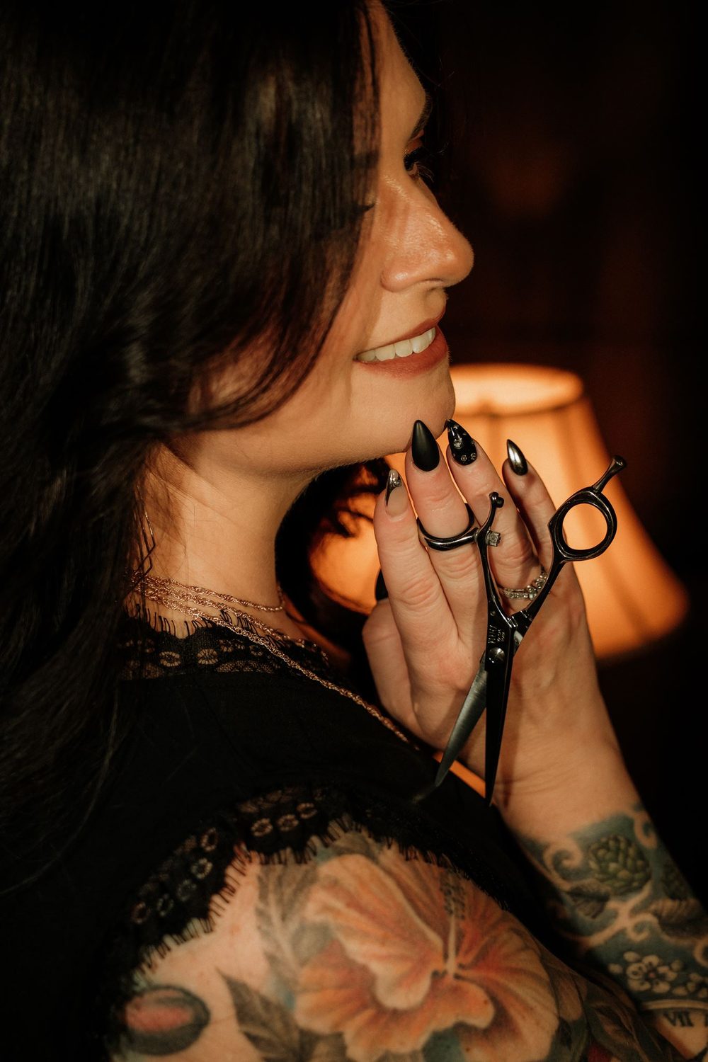 Profile portrait holding shears