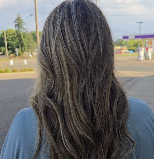 Smoked ash brunette, long and softly layered