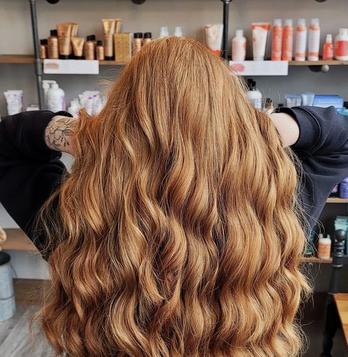 Golden strawberry blonde with deep wave